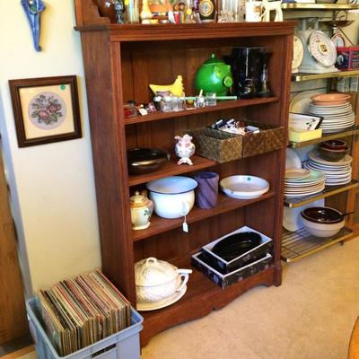Antique wood shelf with beveled mirror.