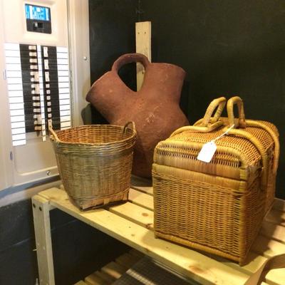 Large collection of contemporary and vintage woven baskets.
