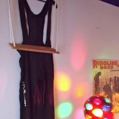 2 Trapeze jumpsuits $25 each
Tall brass globe ball light $75
Trapeze swing $30