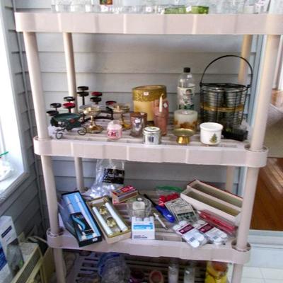 Assorted candle holders and candles