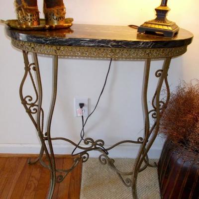 Demi lune marble and metal table $220
28 x 12 x 32"