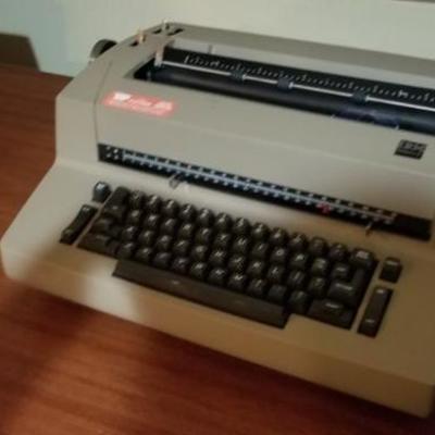 Vintage IBM typewriters (2) with accessories and ribbons