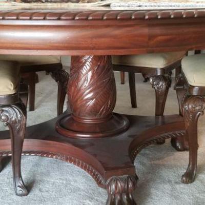 Elegant 60" in round table and 6 chairs