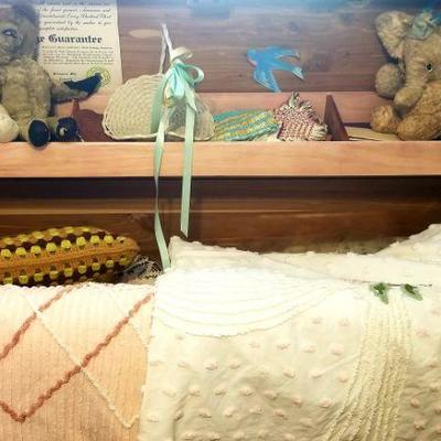 Cedar chest and coverlets