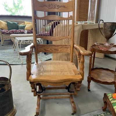 Antique rocking chair with old style mechanical rocker