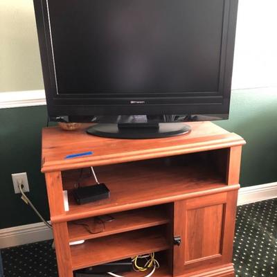 Television cabinet (32-1/2"W 19-1/2"D 29-1/2"H) - $75