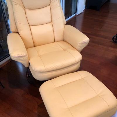 Creamy yellow swivel lounger w/storage ottoman (36"W 55"L w/o ottoman 41"H) - some wear evident - $45