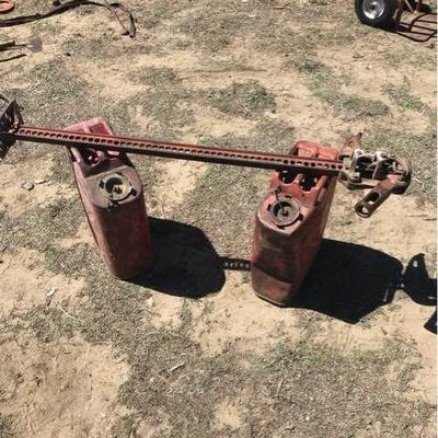 Jack and 2 Metal Gas Cans