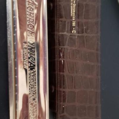One of 5 harmonicas