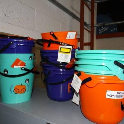 Big stack of halloween buckets.