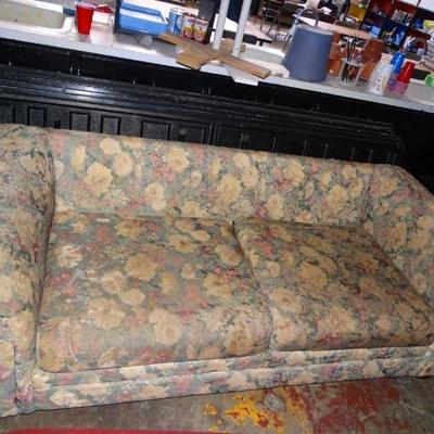 Couch, missing back cushions.