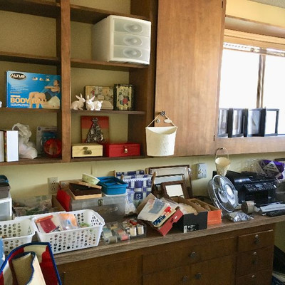 Craft supplies, office supplies, Christmas items, binders, picture frames.  Vintage radios, slide projector, slides, and a lot more.