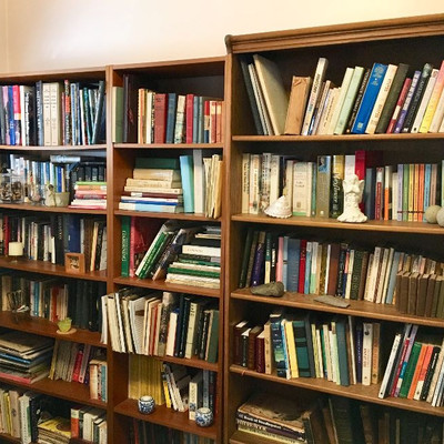Another library with a vast collection of books, both old and new.  Three book cases, these book cases are for sale.  The other book...