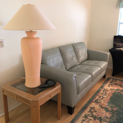 "Relax Furniture International" Spa Blue (Gray Blue) Leatherette Sofa - $475
	(81W  36D  35H)
3 Matching Light Wood End Tables...