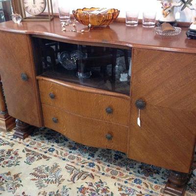 Antique tiger oak bookmatched sideboard/bar.