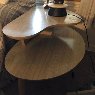 Yes, there are pair of these end tables at the sale
