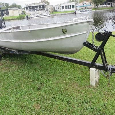 Alumium Jon Boat wth 15 hp Mercury motor and trailer