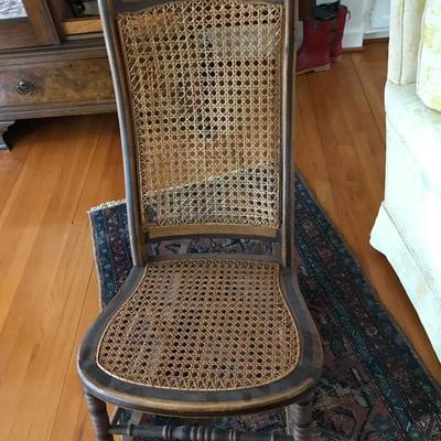 Antique cane rocker $65