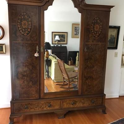 Antique inlaid armoire with beveled mirror $2,990
70 X 21 X 94"
