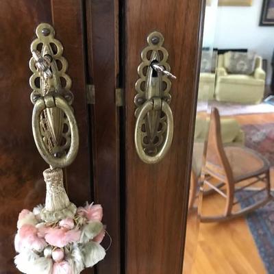 Antique inlaid armoire with beveled mirror $2,990
70 X 21 X 94"