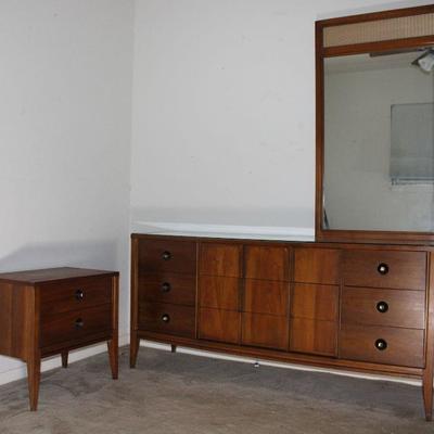 Mid-century walnut finish 9 Drawer Dresser with protective glass top (65â€W x 18â€D  30.5â€H) and Mirror w/aluminum weave Embossed...