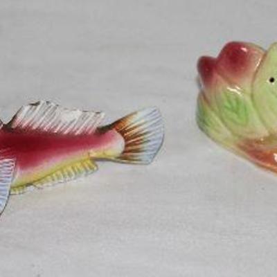 A portion of a Salt and Pepper Shaker Collection: Japan Porcelain Fish set and Shawnee Sunflower Set