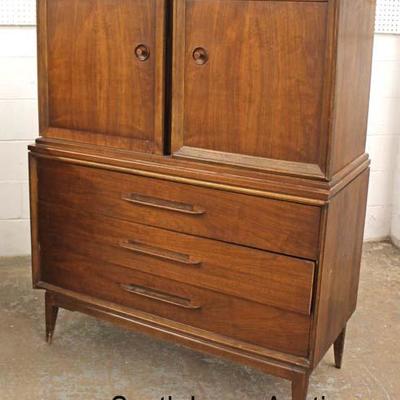  Mid Century Modern Danish Walnut â€œBassett Furnitureâ€ Blind Door Fitted Interior High Chest

Auction Estimate $200-$400 â€“ Located...