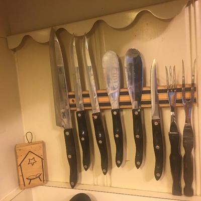 Vintage "Cutco" swirl handle knife set. Includes steak knives, spreader knives, forks, etc. 