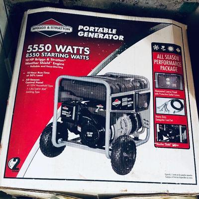 Lightly used generator in original box.