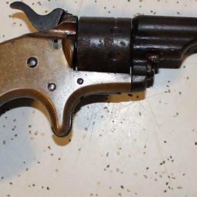 OTHER SIDE OF COLT PISTOL