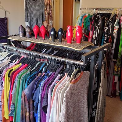 Lots of name brand clothes, some new with tags