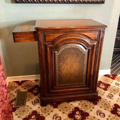 (No. 36) SOLD Free standing antique looking bar. Measures 28"W x 19"D x 36"H. Stores liquor and sides slide out for...