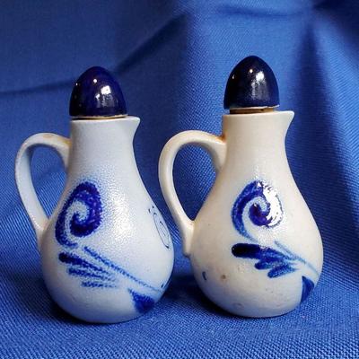 Lot 100: Pr. Small salt Glaze Stoneware cruets $20
