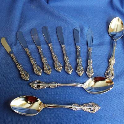 Lot 108: Oneida Michelangelo Stainless 6 Spreaders, 1 Master Butter, 3 Serving Spoons $50