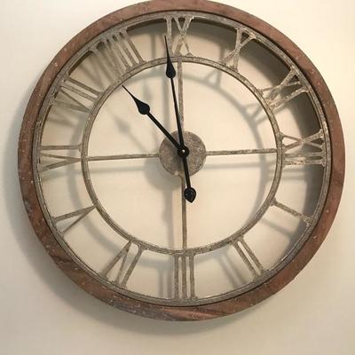 SOLD
$65 
Over sized round, gold metal wall clock with Roman numeral wrapped in a natural wood frame.
Size: 2"H x 25"W x...