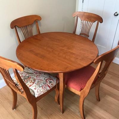 $465 
Solid Wood Table w/1 Leaf 4 chairs and Custom Table Pads