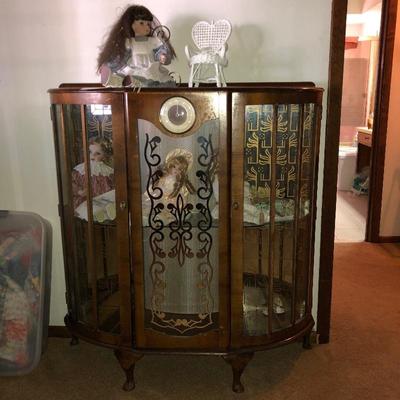 Vintage display cabinet with clock