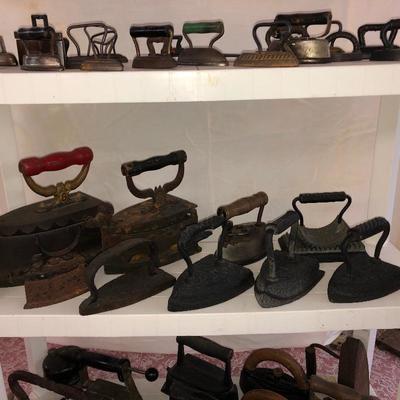 Part of the sad iron collection. There are iron, gas powered, electric and even a fluter 