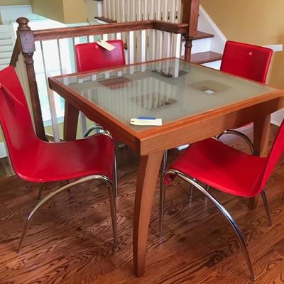 Callagaris Italian birch and frosted glass table $395 SOLD
35 X 35 X 29 1/2"
70" extended
Italian leather stacking chairs $75...