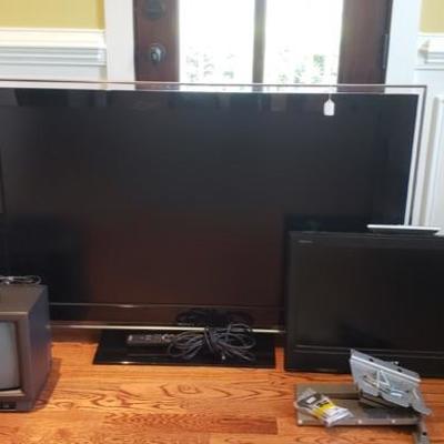 Large flat screen $200
Flat screen wall unit TV $75
Box TV $15