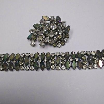 https://www.ebay.com/itm/114235275641	AB0368 USED VINTAGE COSTUME JEWELRY RINESTONE BROOCH & BRACELET MADE BY KRAM	 Auction 
