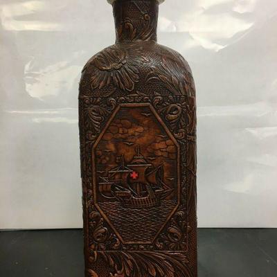 https://www.ebay.com/itm/124205238344	KB0196: Leather Decanter 2.8lbs 4"x4"x11"	 Auction 

