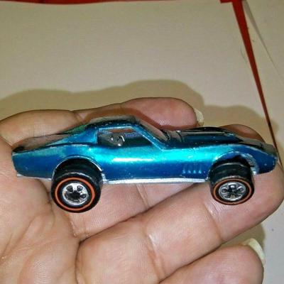 https://www.ebay.com/itm/114241822546	AB0400 USED VINTAGE 1968 BLUE GREEN HOTWHEELS CUSTOM CORVETTE RED LINE WHEELS M	 Auction 
