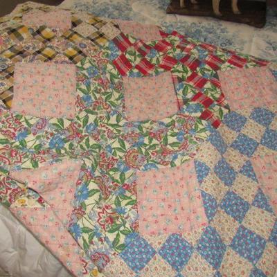 Hand quilted quilt made with feed sack material