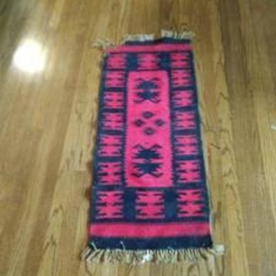 19 in by 43 in southwestern rug some corner damage
