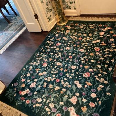Machine made floral rug