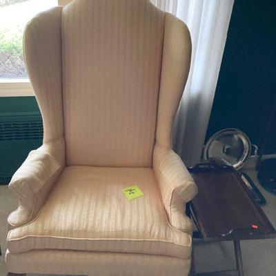 Really high back wing chair. 