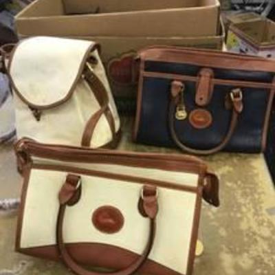 3 Dooney and Bourke leather bags. 2 shoulder rises, 1 crossbody (dirty and missing label)