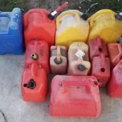 12 fuel cans and 1 water jug