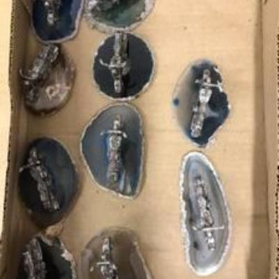 10 motorcycles figurines on geode slabs